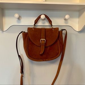 Brown purse with gold hardware